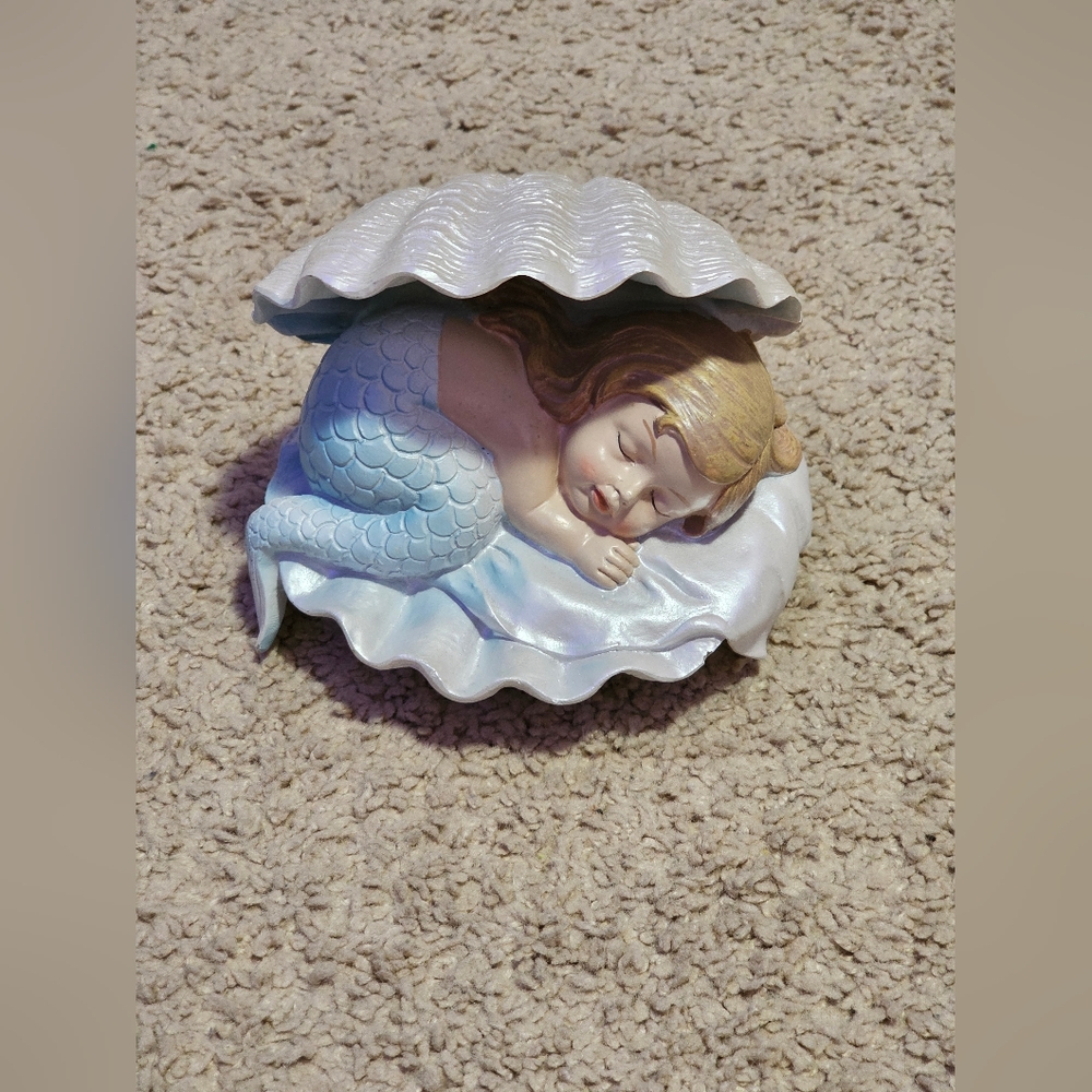 Porcelain Baby Mermaid in Shell Decor